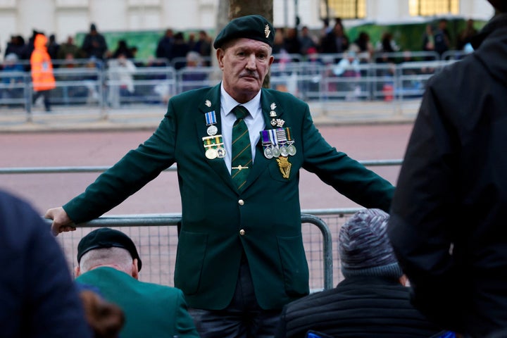 A veteran waits on The Mall on the day of the state funeral and burial of Britain’s Queen Elizabeth in London, Britain September 19, 2022. REUTERS/Kevin Coombs