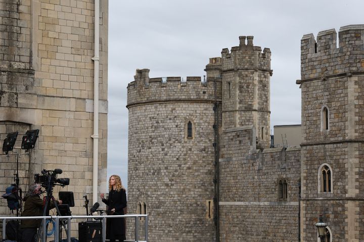 A member of the media works at Windsor Castle on September 19, 2022, ahead of the Committal Service for Britain's Queen Elizabeth II. 