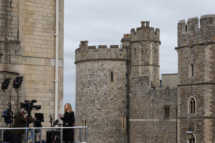 A member of the media works at Windsor Castle on September 19, 2022, ahead of the Committal Service for Britain's Queen Elizabeth II.