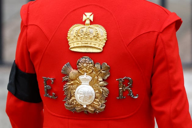 A royal guard stands at Westminster Abbey on the day of the state funeral and burial of Queen Elizabeth in London. Picture date: Monday September 19, 2022.