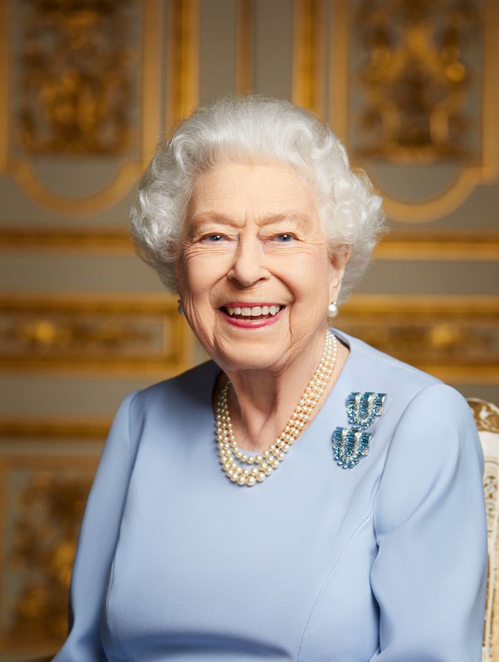In this handout photo issued by Buckingham Palace on Sept. 18, 2022, Queen Elizabeth II is photographed at Windsor Castle in May 2022. 