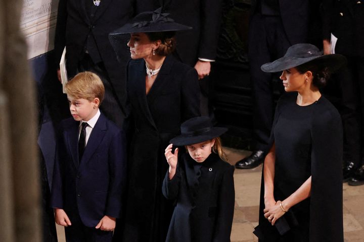 The Princess of Wales, Charlotte, George and the Duchess of Sussex arrive at Westminster Abbey for the State Funeral of Queen Elizabeth II. 