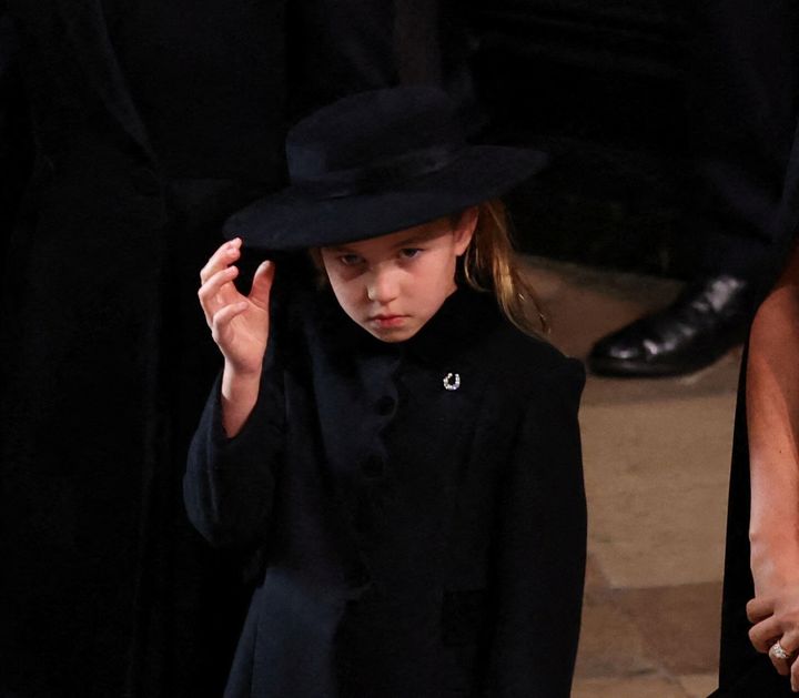 Princess Charlotte attending the queen's funeral.