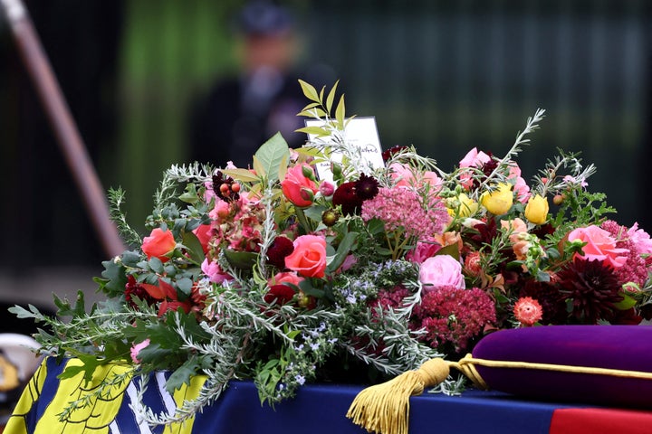 The coffin of Britain's Queen Elizabeth is carried into the Westminster Abbey in London Monday, Sept. 19, 2022. (Hannah McKay/Pool Photo via AP)