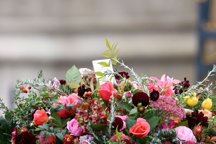 Flowers sit on the coffin of Queen Elizabeth II.