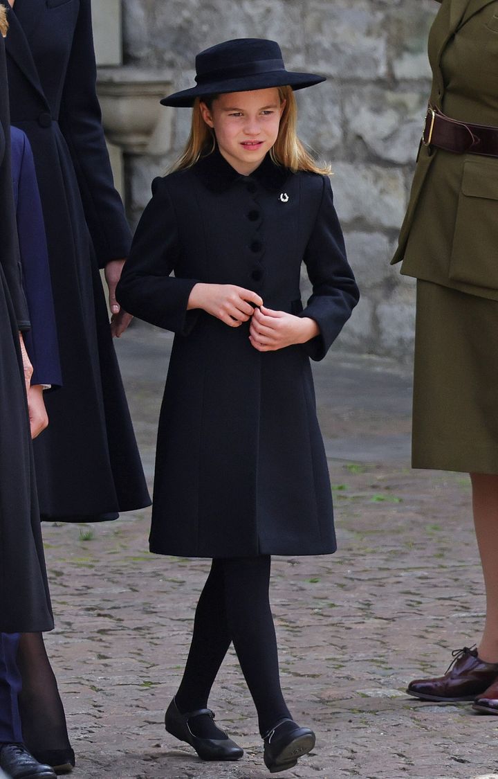 Princess Charlotte of Wales is seen leaving Westminster Abbey. 
