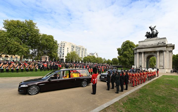 The Royal Hearse carrying the coffin of Queen Elizabeth II at Wellington Arch.
