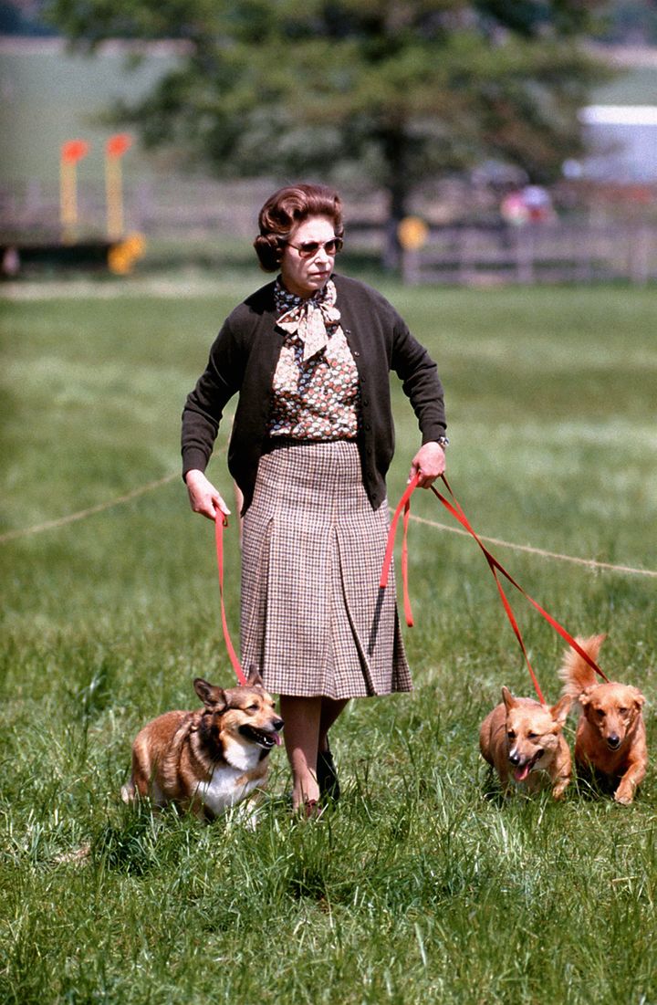 File photo dated 17/5/1980 of Queen Elizabeth II with some of her corgis.