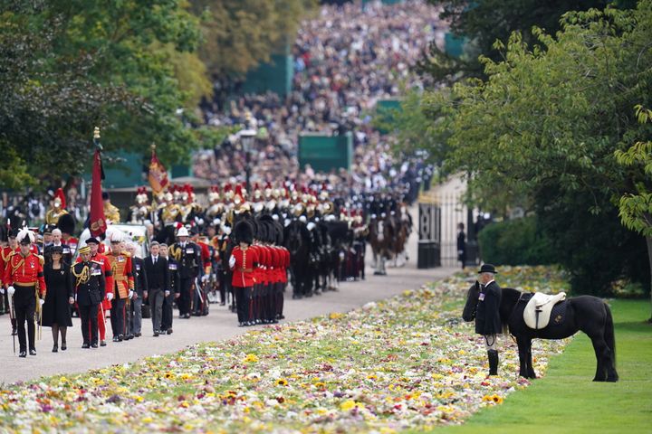 Emma, the monarch's fell pony, stands as the Ceremonial Procession of the coffin of Queen Elizabeth II arrives at Windsor Castle.