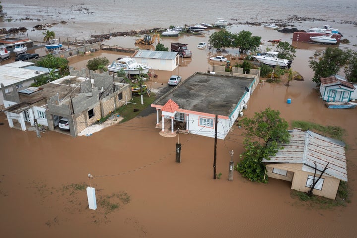 Homes are flooded Monday on Salinas Beach after Hurricane Fiona.