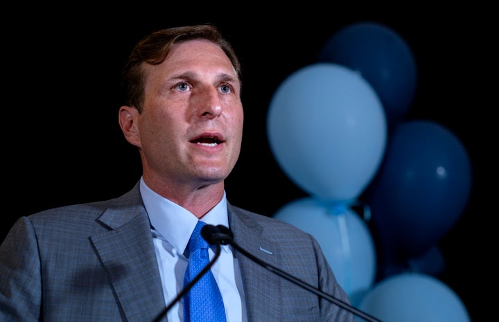 Dan Goldman, a former federal prosecutor, addresses supporters after declaring victory in the Democratic primary on Aug. 23. His general-election race is not considered competitive.