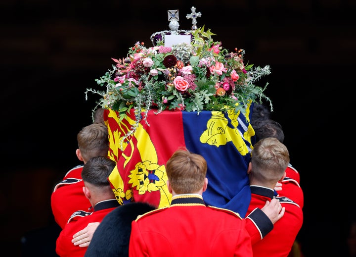 Pallbearers carry Queen Elizabeth II's coffin into St George's Chapel, Windsor Castle