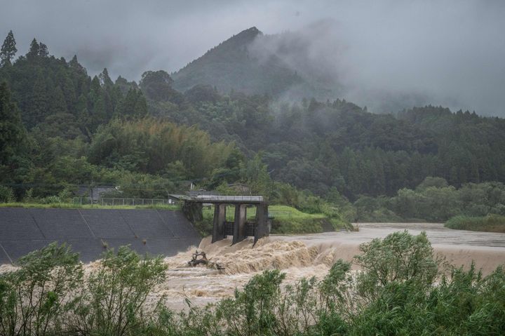 Water flows along the Sendai River as a result of Typhoon Nanmadol in Ebino on September 19