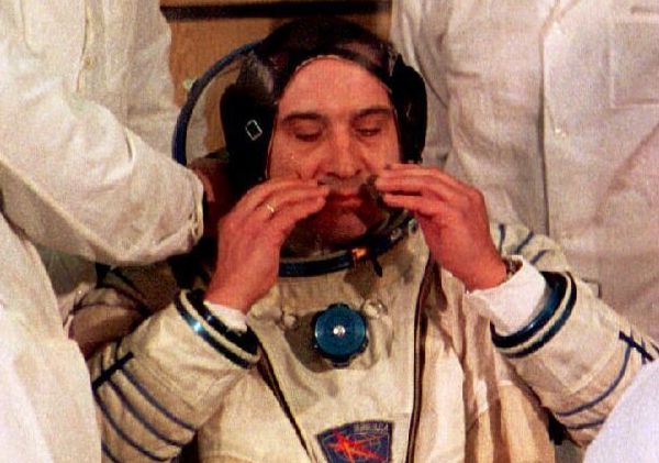 Polyakov being assisted mere moments before liftoff on Jan. 8, 1994.