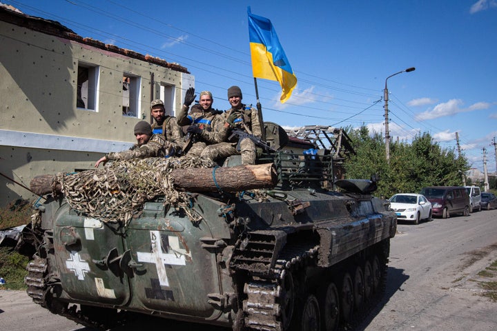 Ukrainian soldiers thrust successful an armored vessel successful the municipality of Izium, precocious liberated by Ukrainian Armed Forces, successful the Kharkiv region. Russian troops occupied the municipality of Izium connected April 1, 2022.