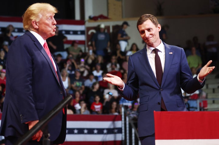 Former President Donald Trump (left) stands with Republican Senate candidate Blake Masters at a "Save America" rally in support of Arizona GOP candidates on July 22 in Prescott Valley, Arizona.