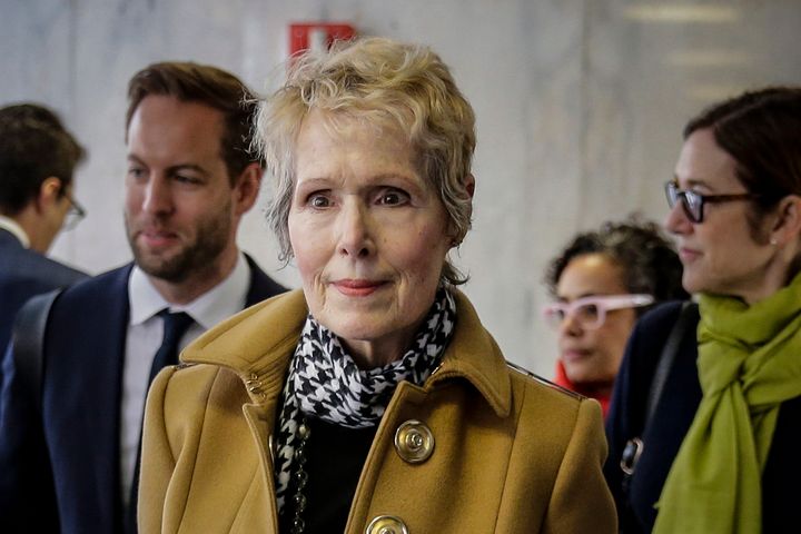 E. Jean Carroll, center, waits to enter a courtroom in New York for her defamation lawsuit against Donald Trump in March 2020.