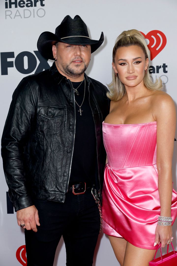 Jason Aldean and Brittany Aldean attend the 2022 iHeartRadio Music Awards at The Shrine Auditorium in Los Angeles on March 22, 2022.