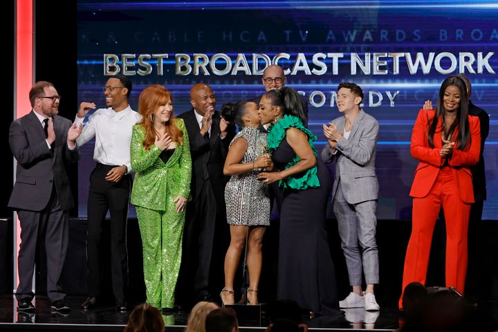 From left: Patrick Schumacker, Tyler James Williams, Lisa Ann Walter, William Stanford Davis, Quinta Brunson, Justin Halpern, Sheryl Lee Ralph, Perfetti, Randall Einhorn and Janelle James accept the award for Best Broadcast Network Series, Comedy onstage during the 2nd Annual Hollywood Critics Association TV Awards in August.
