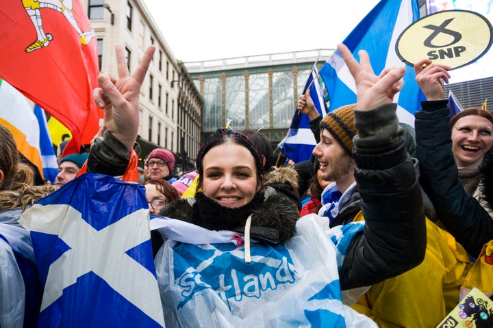 Thousands of Scottish independence supporters march through Glasgow during an All Under One Banner march in 2020.