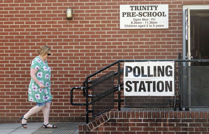 A voter arrives at a polling station at Trinity Pre-School in Wakefield, West Yorkshire.