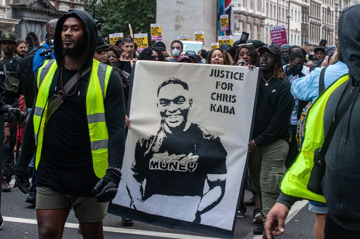Thousands gathered in London holding placards with messages including "Black Lives Matter" and "Justice For Chris Kaba"