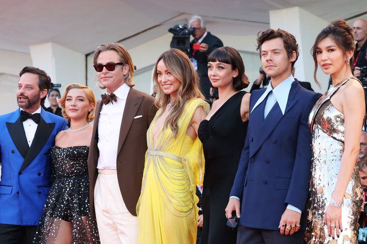 (L-R) Nick Kroll, Florence Pugh, Chris Pine, Olivia Wilde, Sydney Chandler, Harry Styles and Gemma Chan attend the Don't Worry Darling red carpet at the 79th Venice International Film Festival