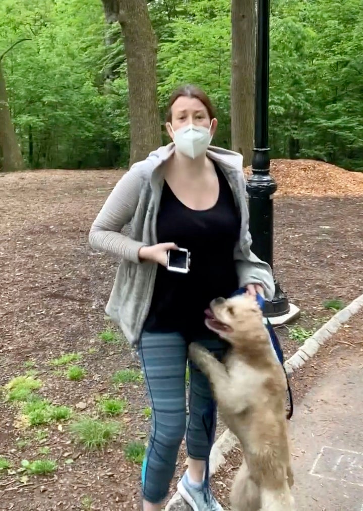 Amy Cooper is shown with her canine successful a viral video from May 2020.