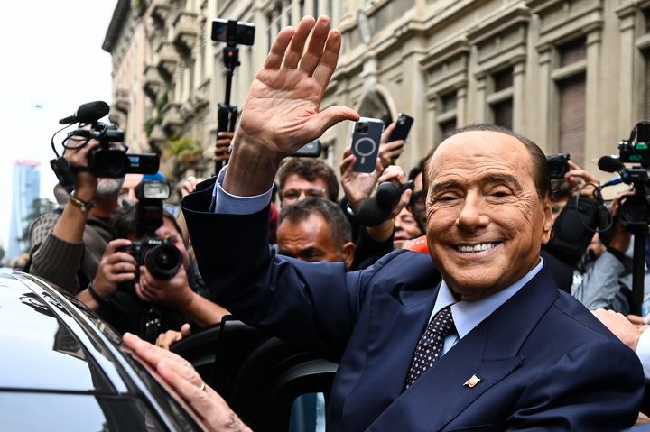 Silvio Berlusconi, leader of Forza Italia gestures after casting his vote during the general elections in Milan, Italy on Sunday.
