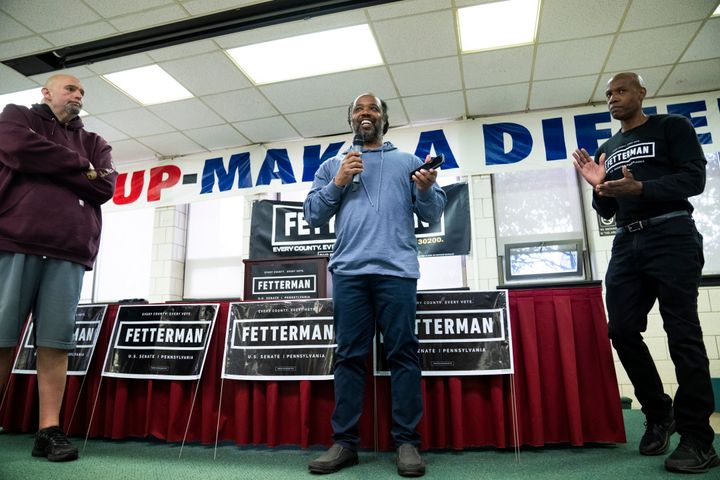 Lee Horton (center) and Dennis "Freedom" Horton (right) speak at a campaign event for Fetterman (left) in Plymouth Meeting in April. They introduced themselves to Philadelphia rally-goers on Saturday as well.