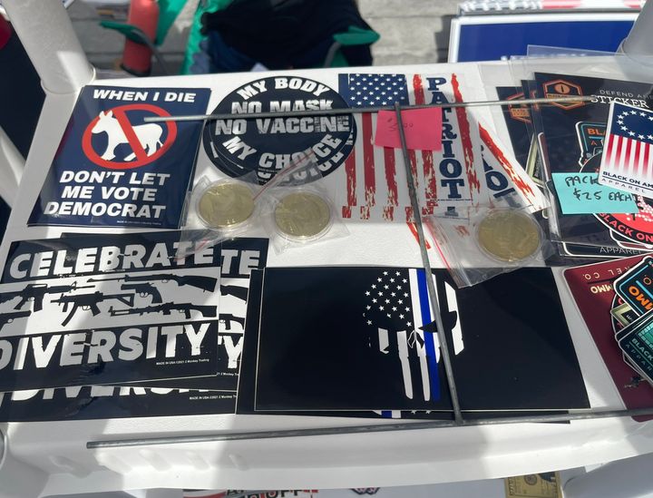 Stickers for sale on the steps of the Pennsylvania State Capitol Building during a rally for Mastriano.