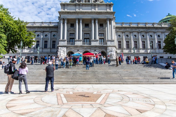 An embarrassingly small rally for Doug Mastriano, the Republican nominee for governor, at the Pennsylvania State Capitol Building on Saturday.