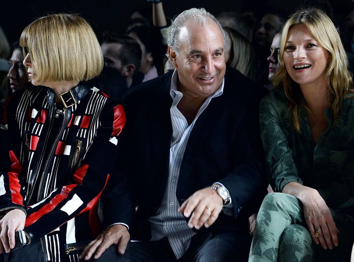 Anna Wintour, Sir Philip Green and Kate Moss attend the Topshop Unique show at London Fashion Week AW14 at Tate Modern on February 16, 2014 in London, England. 