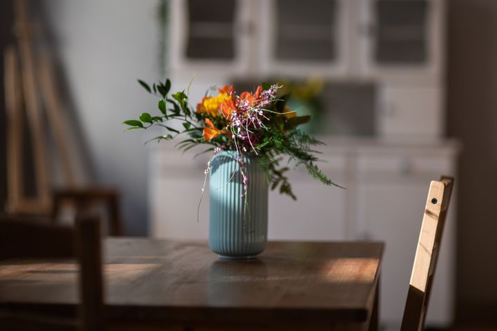 Don't make the host scramble to find a vase for your flowers.