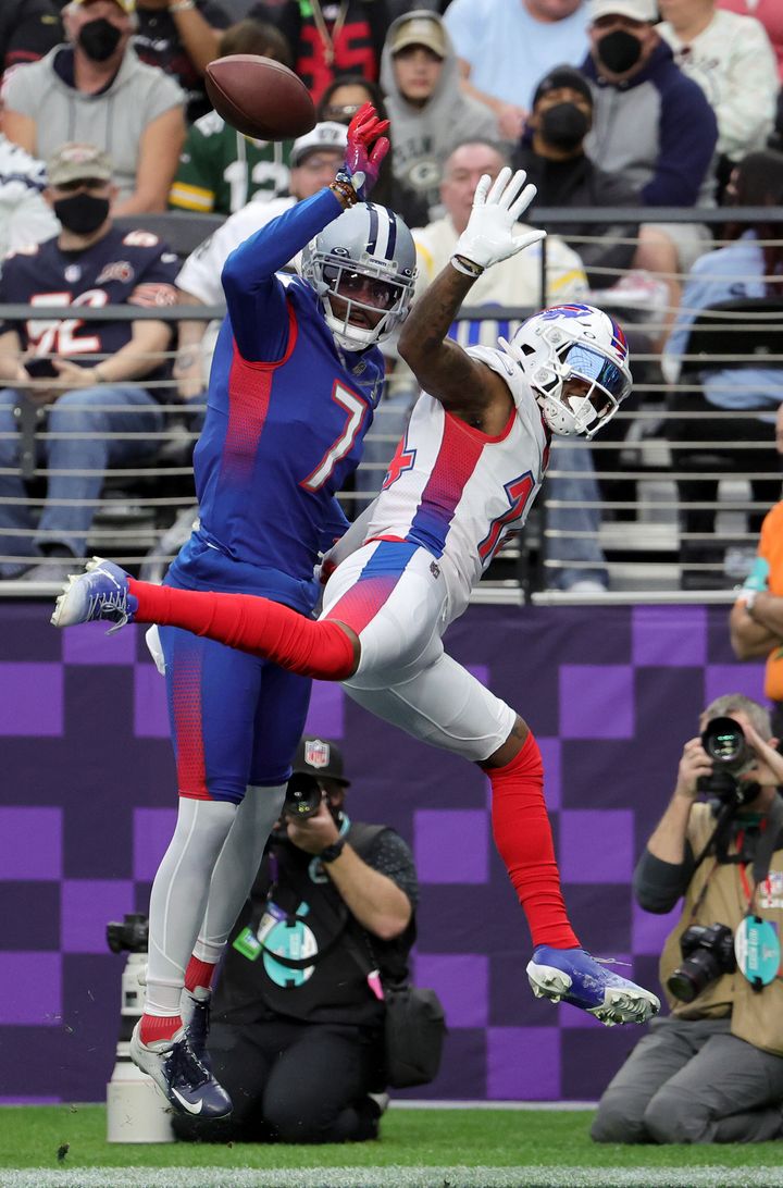 Trevon Diggs #7 of the NFC has his pass broken up by brother Stefon Diggs of the AFC in the 2022 NFL Pro Bowl.