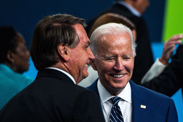Bolsonaro and U.S. President Joe Biden chat after posing for a family photo during the Ninth Summit of the Americas in Los Angeles, June 10.