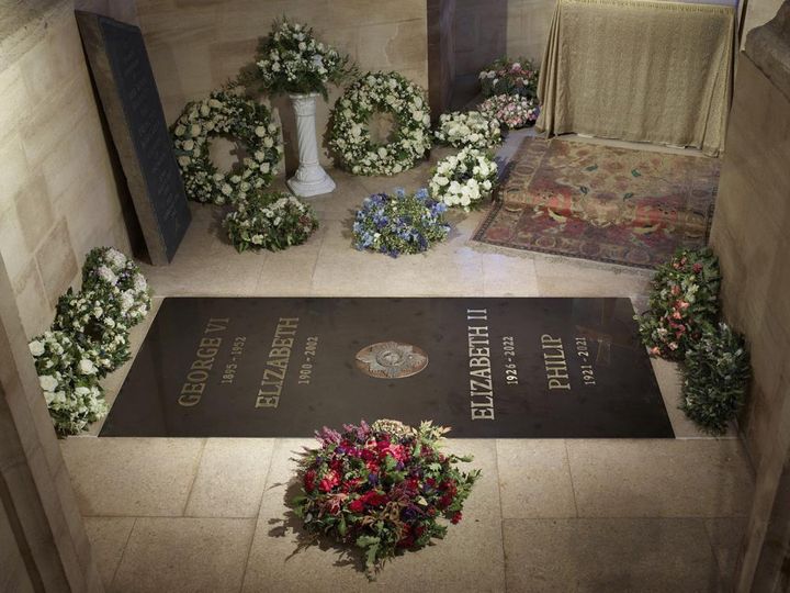 This photo provided by Buckingham Palace on Saturday Sept. 24, 2022 shows the ledger stone at the King George VI Memorial Chapel, St George's Chapel, Windsor Castle in Windsor, England.