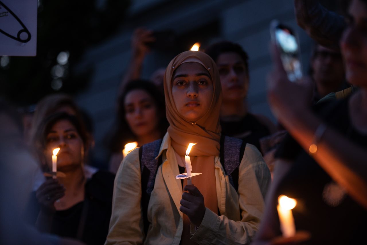 Almost 1,000 people are gathered outside of Wheeler Hall Auditorium of the University of California, Berkeley, on Sept. 23, to protest the Iranian government after the death of 22-year-old Mahsa Amini in custody in Tehran.