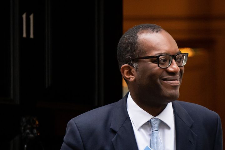 Chancellor Kwasi Kwarteng leaves 11 Downing Street to make his way to deliver his mini-budget.