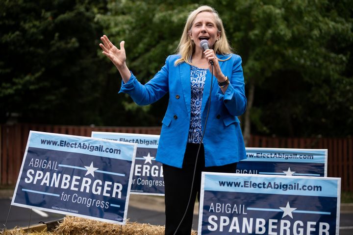 Democratic Rep. Abigail Spanberger addresses a crowd during a rally in Prince William County, Virginia. Abortion rights are factoring into the midterms this year in swing-district races.