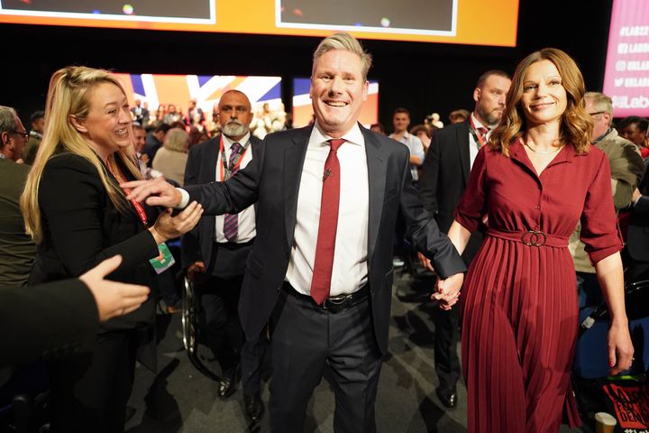 Keir Starmer with his wife Victoria leave the leave the hall after his conference speech.