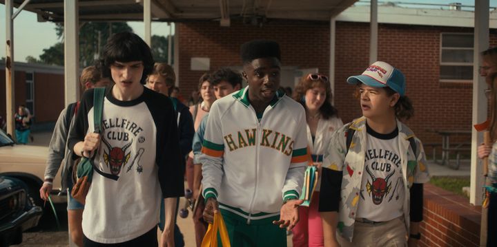 Caleb in character as Lucas with co-stars Finn Wolfhard and Gaten Matarazzo