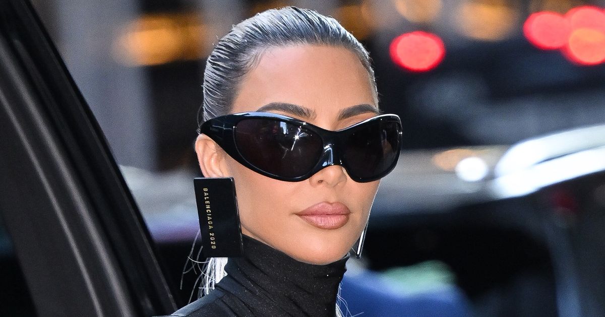 Kim Kardashian Has To Go Topless Just To Text While Wearing This Outfit