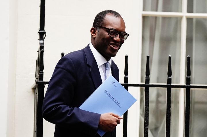 Chancellor Kwasi Kwarteng leaves 11 Downing Street to make his way to deliver his mini-budget.