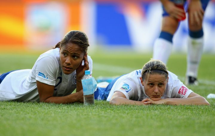 Alex Scott and Kelly Smith of England at the FIFA Women's World Cup on June 27, 2011 in Wolfsburg, Germany. (Photo by Alex Livesey - FIFA/FIFA via Getty Images)