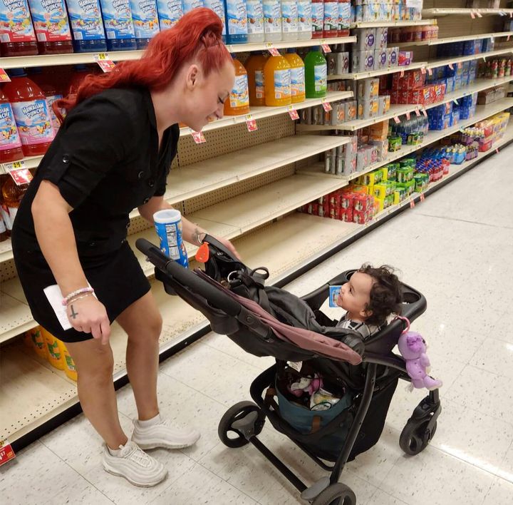 Jazmin Valentine is seen with her baby at a supermarket. Valentine filed a federal lawsuit Tuesday alleging that nurses and staff at the Washington County jail in Maryland ignored her screams and plea for help as she gave birth to her daughter in July 2021.