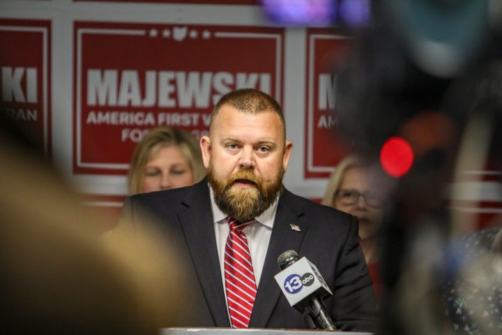Ohio Republican congressional candidate J.R. Majewski defends his military record during a news conference Friday, Sept. 23, 2022, at the Lucas County Republican headquarters in Holland, Ohio. Majewski has campaigned by presenting himself as an Air Force combat veteran who deployed to Afghanistan after the 9/11 terrorist attacks. Military documents obtained by The Associated Press through a public records request, indicate Majewski never deployed to Afghanistan but instead completed a six-month stint helping to load planes at an air base in Qatar, a longtime U.S. ally that is a safe distance from the fighting. (Phillip L. Kaplan/The Blade via AP)