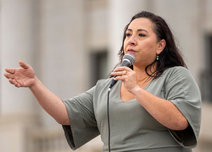 FILE - Rep. Angela Romero speaks on the steps of the state Capitol, during a rally to gain support for removing the clergy exemption from mandatory reporting in cases of abuse and neglect, on Friday, Aug. 19, 2022, in Salt Lake City.