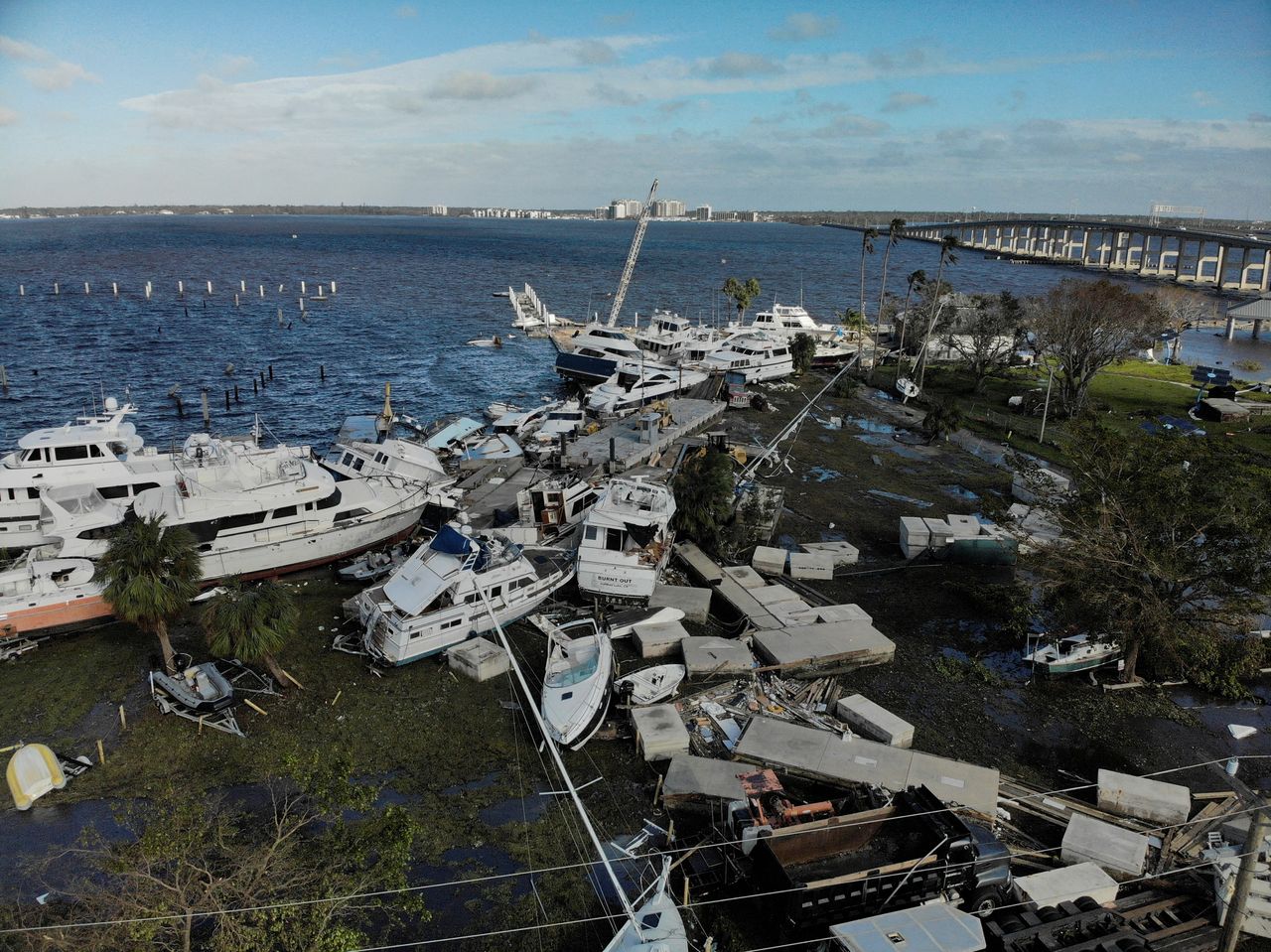 Damaged boats are seen after Hurricane Ian caused widespread destruction in Fort Myers on Thursday.