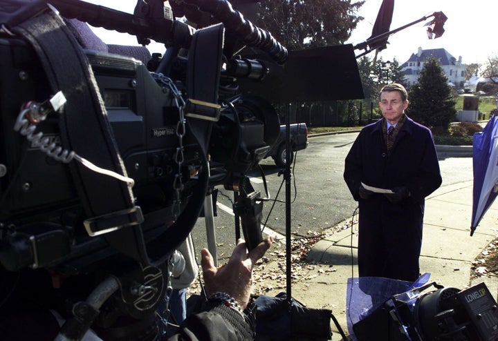 Plante broadcasts from outside then-Vice President Al Gore's residence in Washington on Dec. 13, 2000.